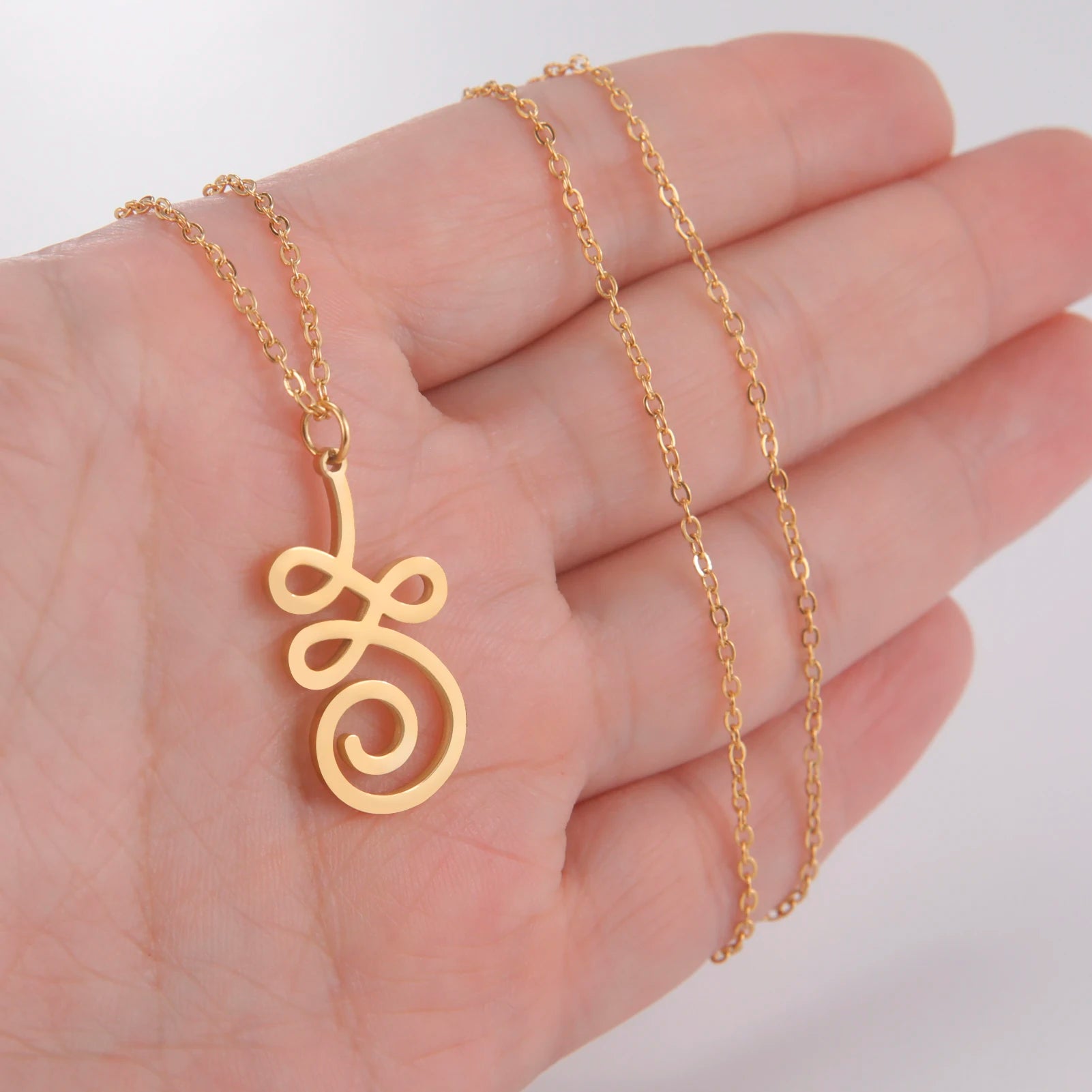 Collier pendentif tourbillon en spirale avec breloques sculptées en forme de vortex au design simple de Dreamtimes pour cadeau, bijoux en acier inoxydable