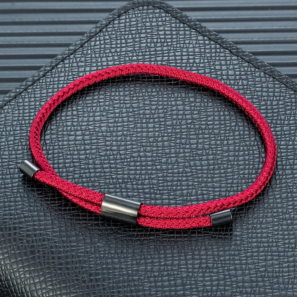 MKENDN Modisches schwarzes Armband für Männer und Frauen, verstellbar, langlebiges Marine-Nylon mit Verschluss aus poliertem schwarzem Edelstahl