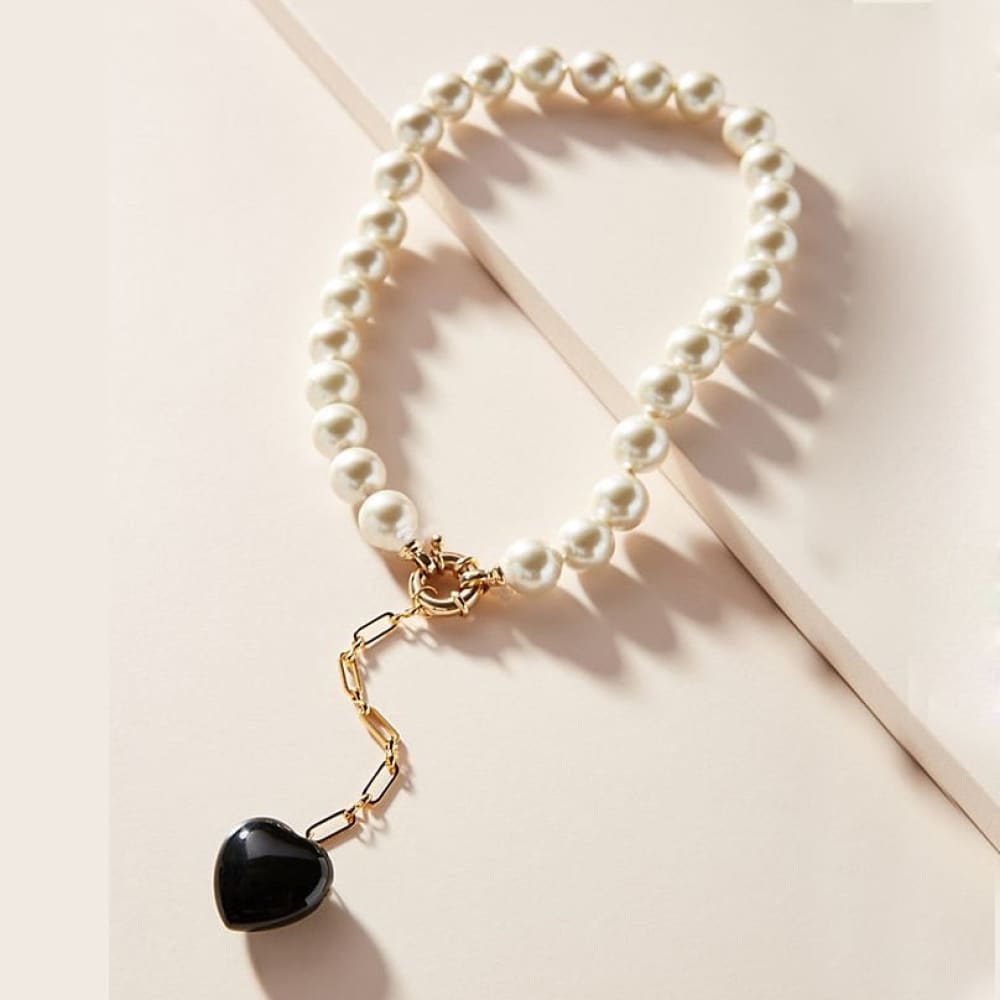 Puka Shell Necklace With Shark Tooth