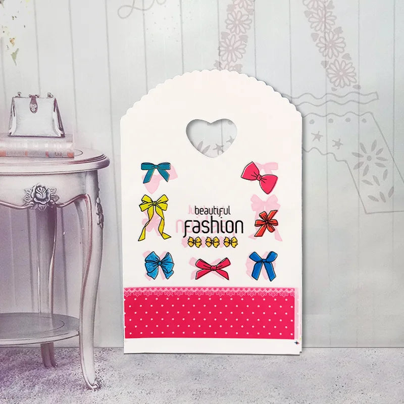 50 teile/los Verschiedene Muster Schmuck Plastiktüte Herzförmigen Ovalen Griffen Mini Geschenkverpackungsbeutel Shop Kleine Einkaufstaschen