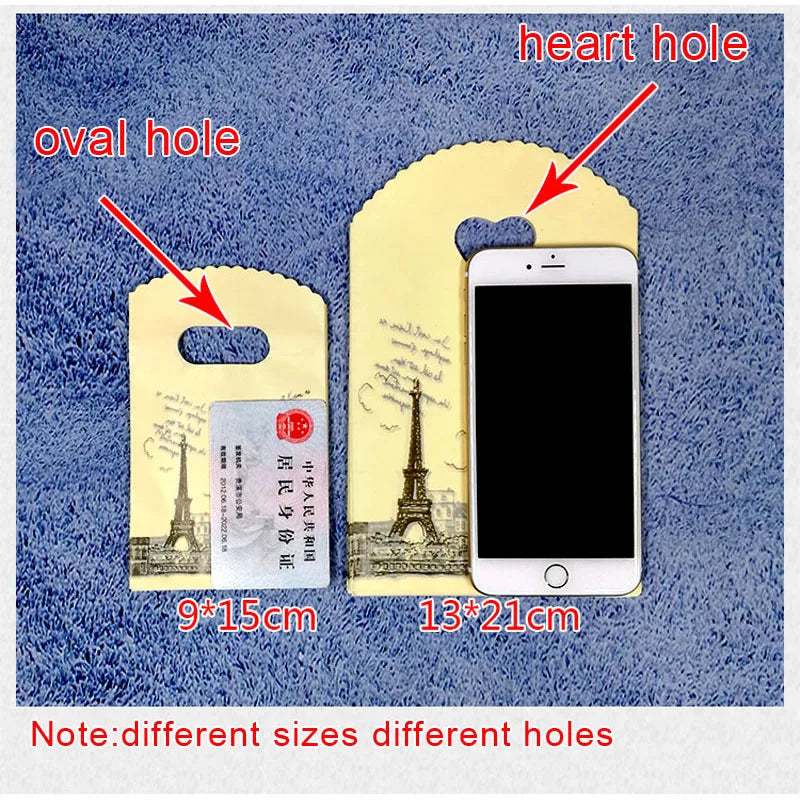 50 teile/los Verschiedene Muster Schmuck Plastiktüte Herzförmigen Ovalen Griffen Mini Geschenkverpackungsbeutel Shop Kleine Einkaufstaschen