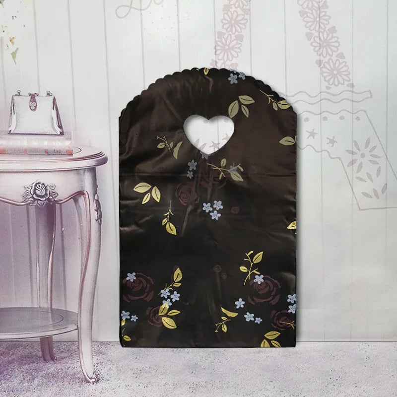 50 teile/los Verschiedene Muster Schmuck Plastiktüte Herzförmigen Ovalen Griffen Mini Geschenkverpackungsbeutel Shop Kleine Einkaufstaschen