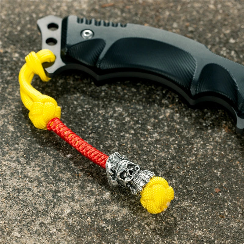 MKENDN New Design Japanese demon Evil mask Men Keychains Backbag Knife Pendant Men Survival Lanyard Rope Handmade Jewelry Gifts