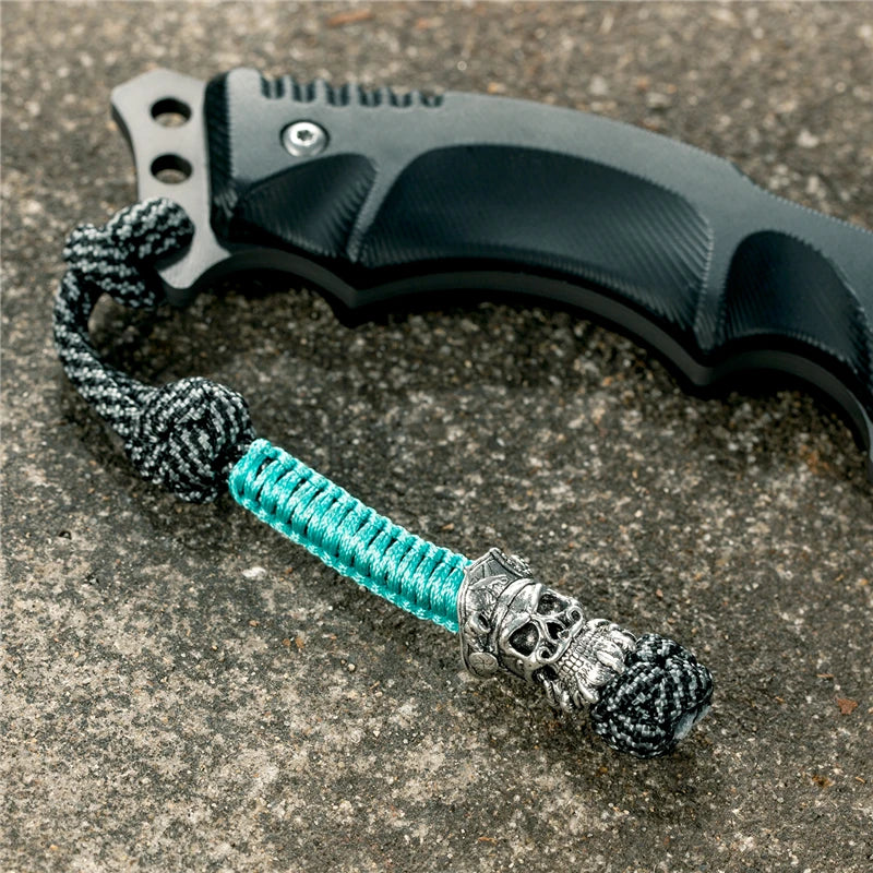 MKENDN New Design Japanese demon Evil mask Men Keychains Backbag Knife Pendant Men Survival Lanyard Rope Handmade Jewelry Gifts