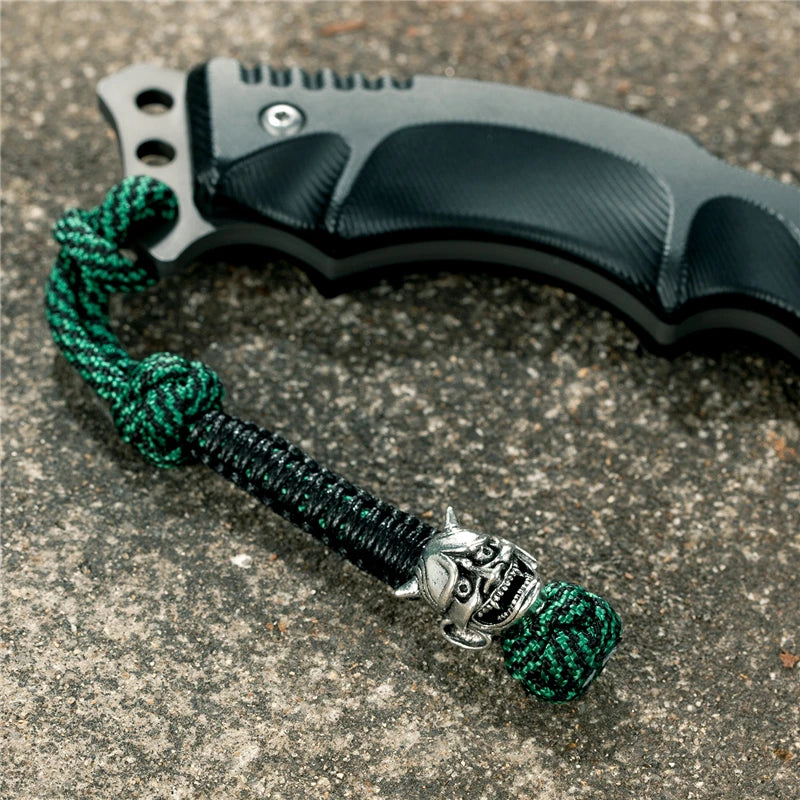 MKENDN New Design Japanese demon Evil mask Men Keychains Backbag Knife Pendant Men Survival Lanyard Rope Handmade Jewelry Gifts