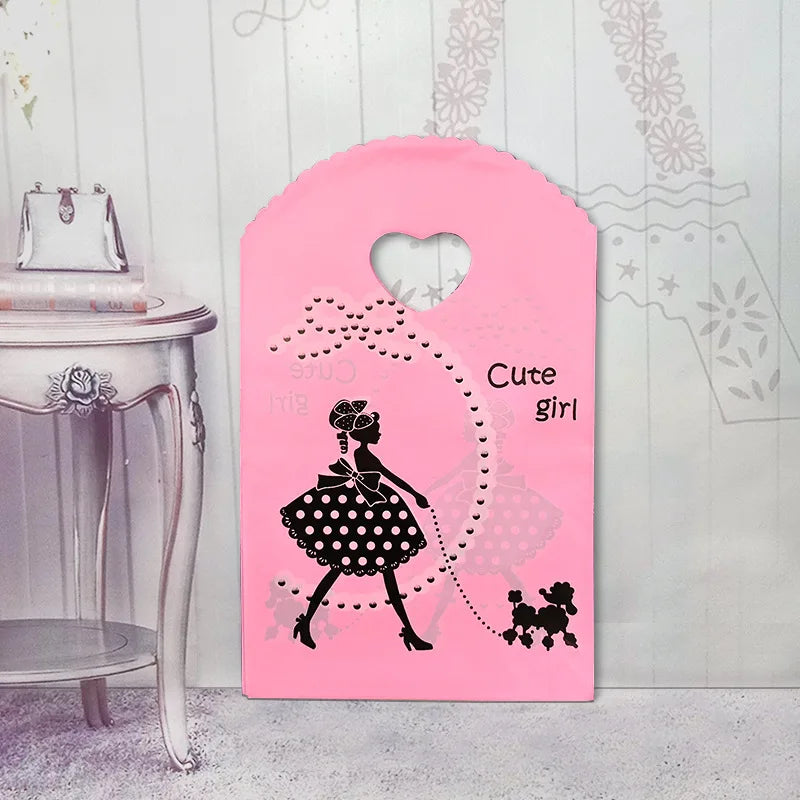 50 teile/los Verschiedene Muster Schmuck Plastiktüte Herzförmigen Ovalen Griffen Mini Geschenkverpackungsbeutel Shop Kleine Einkaufstaschen