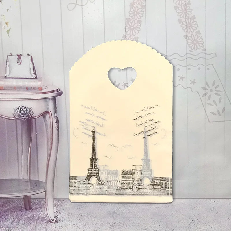 50 teile/los Verschiedene Muster Schmuck Plastiktüte Herzförmigen Ovalen Griffen Mini Geschenkverpackungsbeutel Shop Kleine Einkaufstaschen