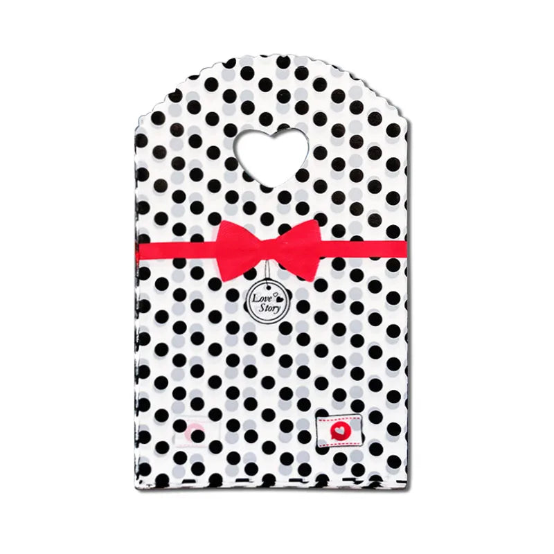 50 teile/los Verschiedene Muster Schmuck Plastiktüte Herzförmigen Ovalen Griffen Mini Geschenkverpackungsbeutel Shop Kleine Einkaufstaschen