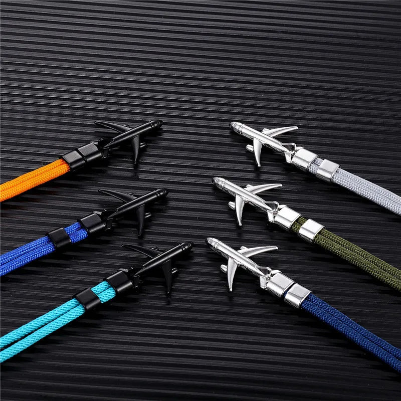 MKENDN Ankerarmbänder für Damen und Herren, Charm-Armband aus Paracord mit Überlebensseilkette und Metallhaken im Flugzeugstil, Sommer-Schmuck