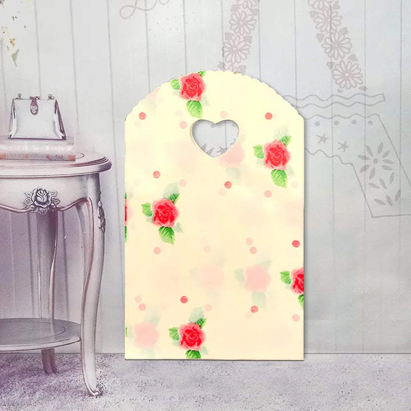 50 teile/los Verschiedene Muster Schmuck Plastiktüte Herzförmigen Ovalen Griffen Mini Geschenkverpackungsbeutel Shop Kleine Einkaufstaschen