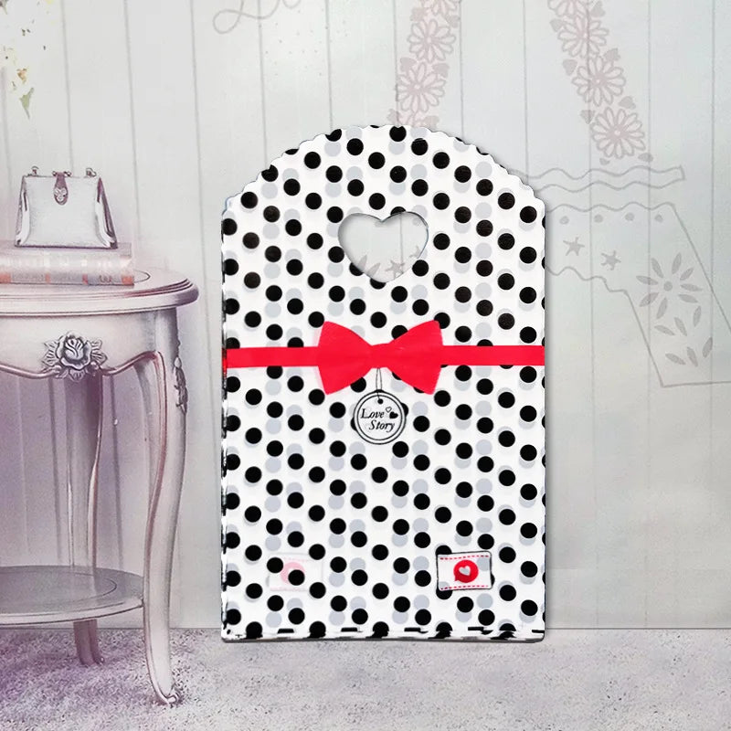 50 teile/los Verschiedene Muster Schmuck Plastiktüte Herzförmigen Ovalen Griffen Mini Geschenkverpackungsbeutel Shop Kleine Einkaufstaschen