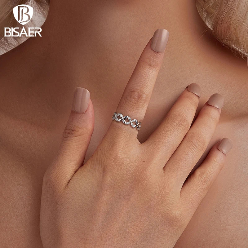 BISAER Bague en argent sterling 925 à quatre pétales avec sertissage pavé et bande en zircon blanc plaqué pour femme, bijoux fins de fête EFR614
