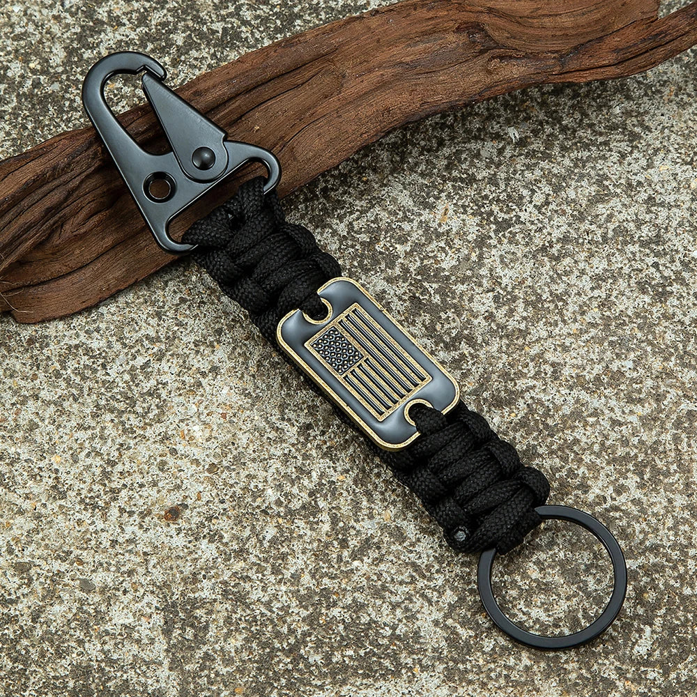MKENDN Tactical Survival Tools Keychain with Bronze USA Flag Men Outdoor Camping Emergency Paracords Olecranon Clip Carabiner
