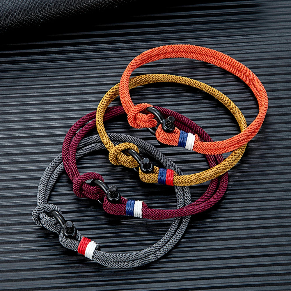 MKENDN Schwarzes Armband aus Edelstahl mit Hufeisenschnalle für Männer und Frauen, marineblaues Überlebensarmband aus geflochtenem Seil, Paarschmuck