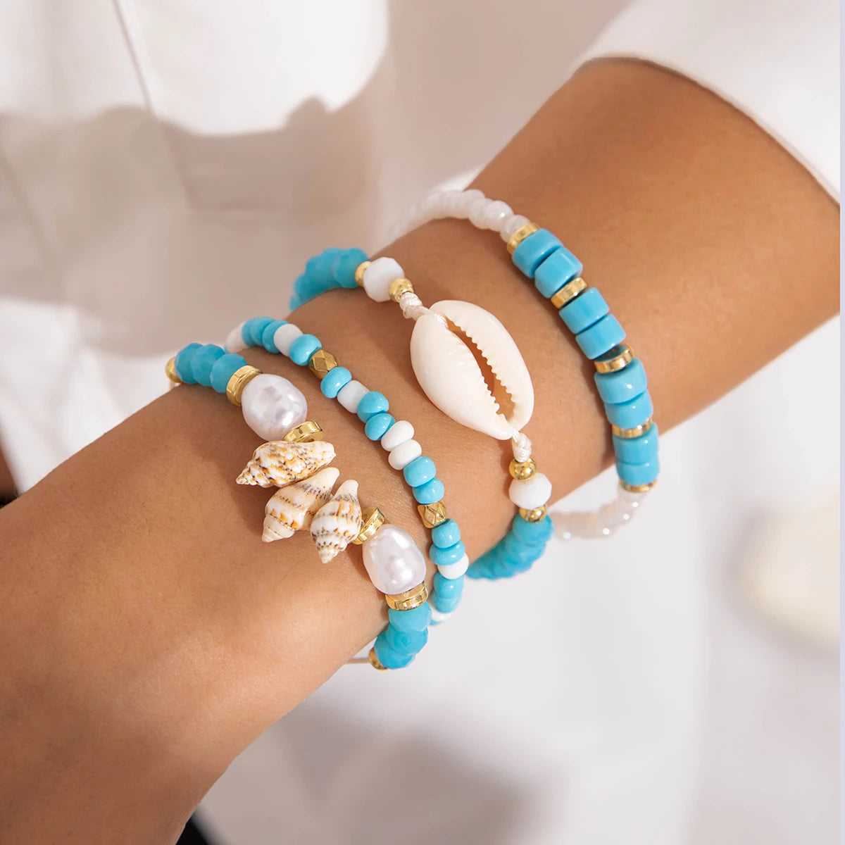Tocona Bohemian Resort Style Shell Beaded Weaving Bracelet Beach Style Starfish Rice Beads Seven Piece Set for Women 25134 - Madeinsea©