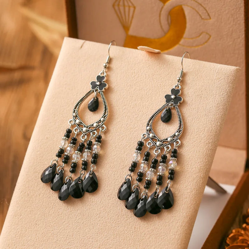 Neue böhmische Ohrringe mit langen Reisperlen in Tropfenform für Damen, ethnisch-retro, tropfenförmig, hohl, baumelnd, Schmuck für Urlaub und Party