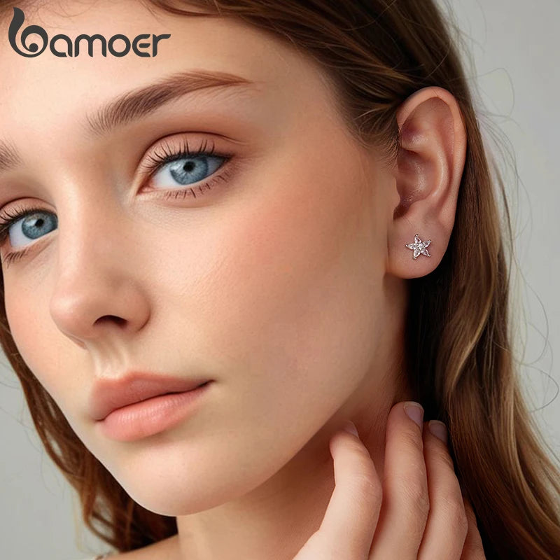 Boucles d'oreilles BAMOER Mini Étoile en argent sterling 925, hypoallergéniques, serties de zirconiums cubiques, en forme de fleur. Bijou brillant à offrir aux femmes et adolescentes.
