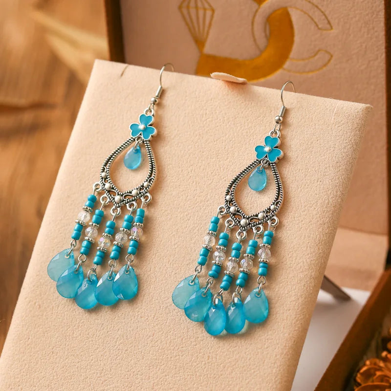 Neue böhmische Ohrringe mit langen Reisperlen in Tropfenform für Damen, ethnisch-retro, tropfenförmig, hohl, baumelnd, Schmuck für Urlaub und Party