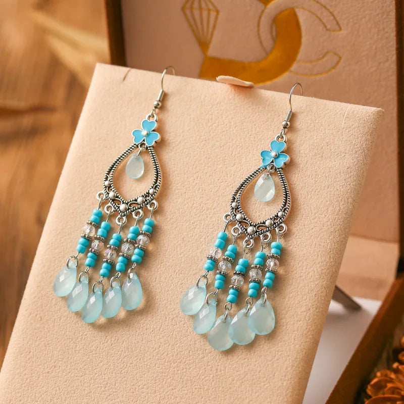 Neue böhmische Ohrringe mit langen Reisperlen in Tropfenform für Damen, ethnisch-retro, tropfenförmig, hohl, baumelnd, Schmuck für Urlaub und Party