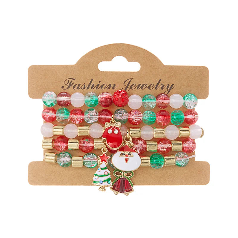 Fröhliche Weihnachten! Armband mit Baum, Weihnachtsmann, Schneemann und Schneemann für Damen. Weihnachtliches Armband mit Schneeflocken, Kristallperlen und Polymerclay-Anhänger. Neujahrsschmuck.