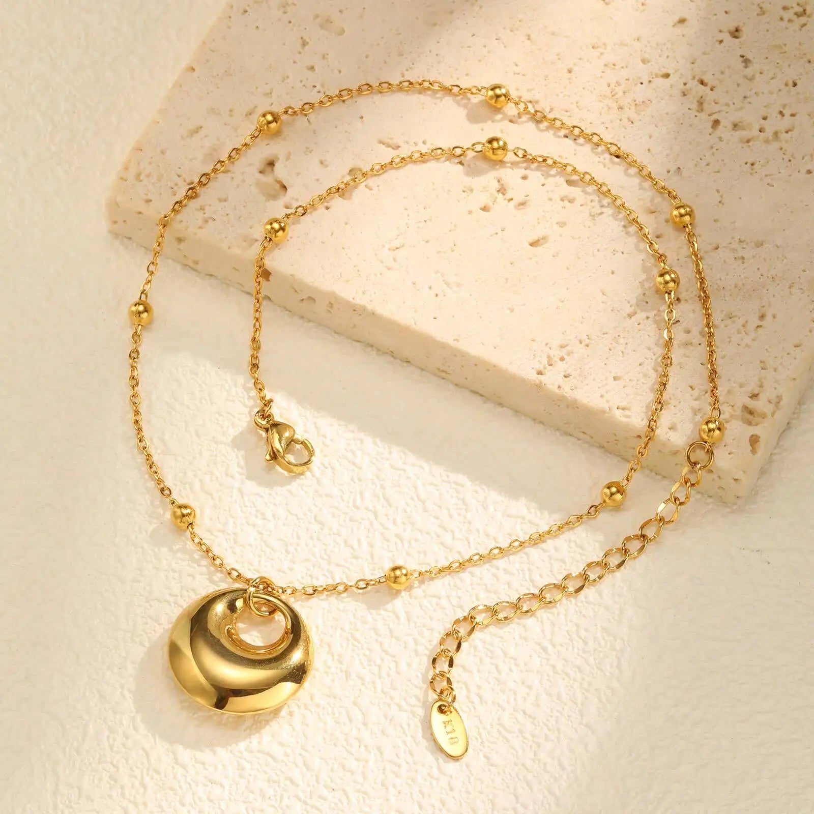 Vnox Fashion Hollow Oval Pendant Necklace For Women,Stainless Steel Water Droplet Necklace,Hand Polished Shining Jewelry Party